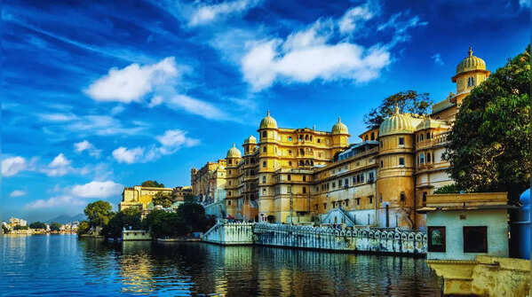 A marble palace seemingly floats on the water's surface.