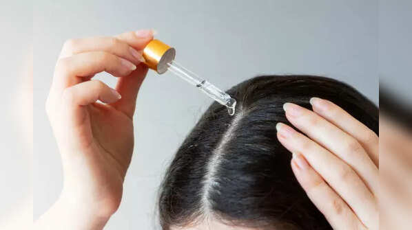 Adding essential oils to hair oil