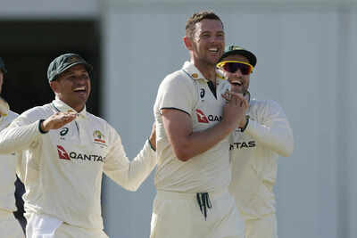 Josh Hazlewood celebrates a wicket against the West Indies