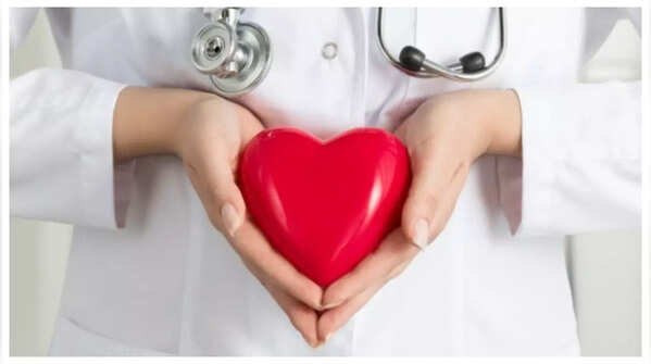 Person clutching their chest, representing chest pain