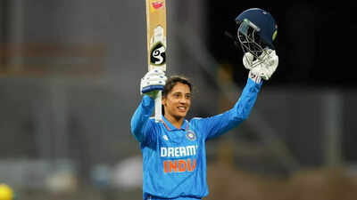 Smriti Mandhana celebrates her record-breaking century.