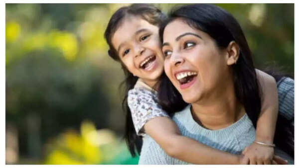 Parent modeling friendly behavior with a neighbor.
