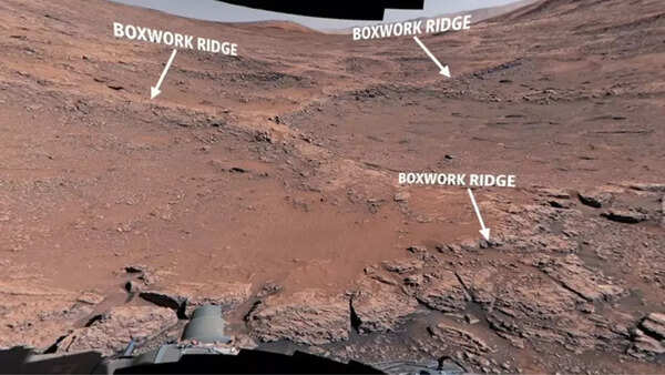 Curiosity rover examines Martian terrain