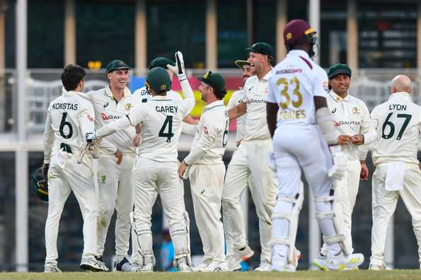 Roston Chase expresses frustration over umpiring decisions.