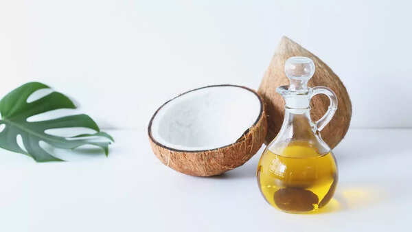 Bottles of hair oil on a shelf