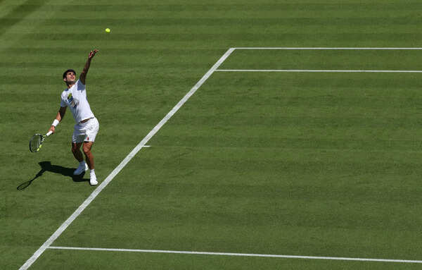 Carlos Alcaraz practices for Wimbledon 2025