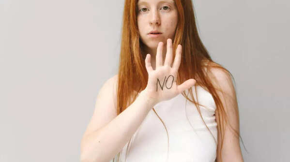 Person confidently setting boundaries without over-apologizing