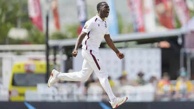 Shamar Joseph celebrates a wicket against Australia