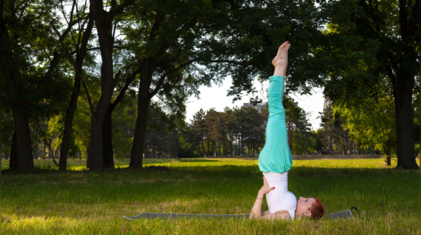 Individual in Sarvangasana, or Shoulder Stand Pose.
